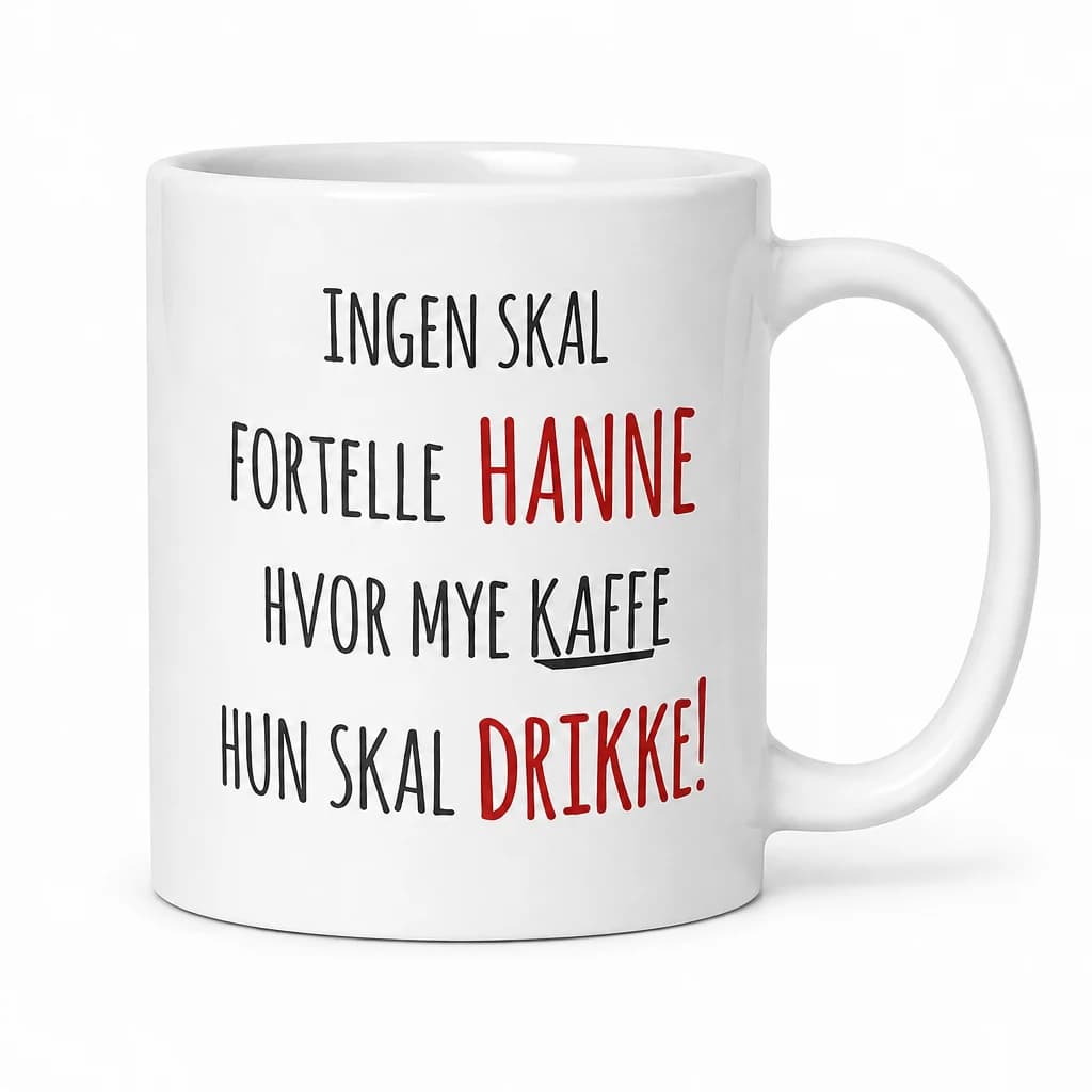 Hvitt kaffekrus med navn og tekst «Ingen skal fortelle Hanne hvor mye kaffe hun skal drikke!» i svart og rødt
