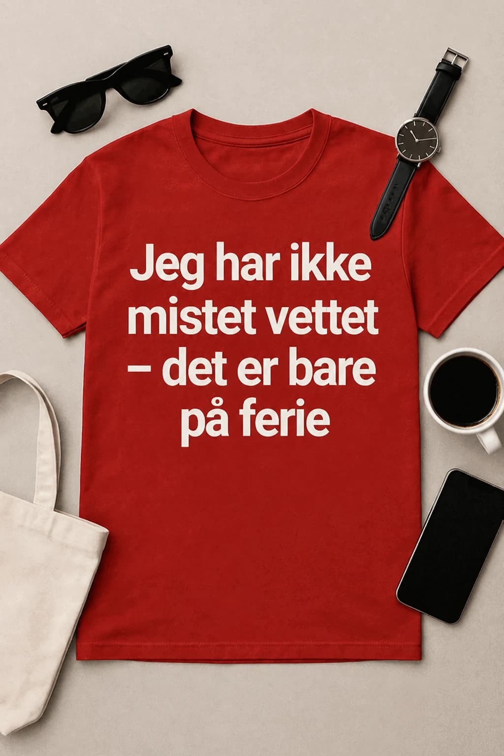 Rød morsom t-skjorte med hvit tekst «Jeg har ikke mistet vettet – det er bare på ferie», med solbriller